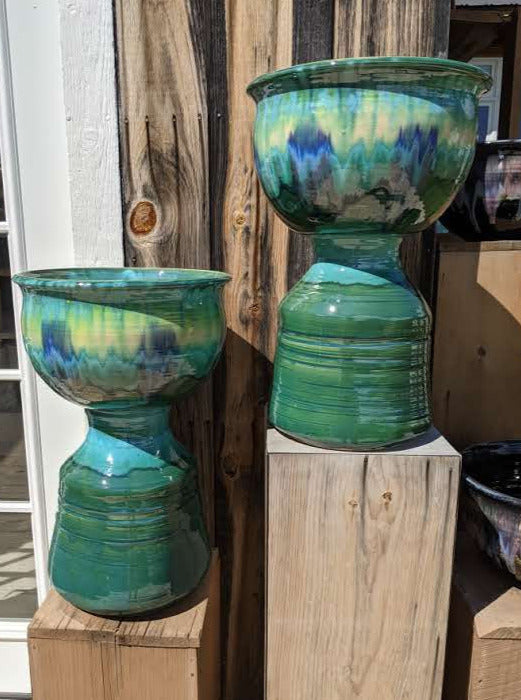 Teal Pedestal Planter on a Deck