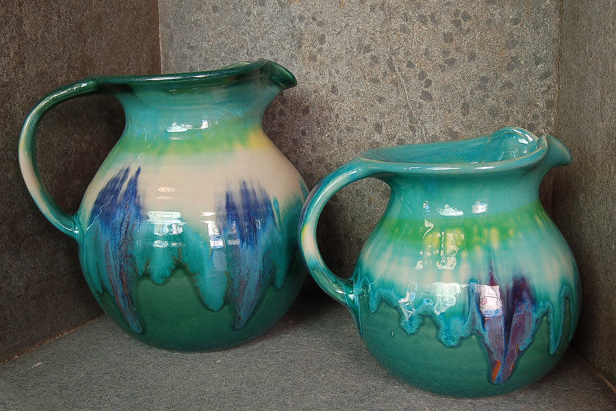 Large and Small Teal Pitchers