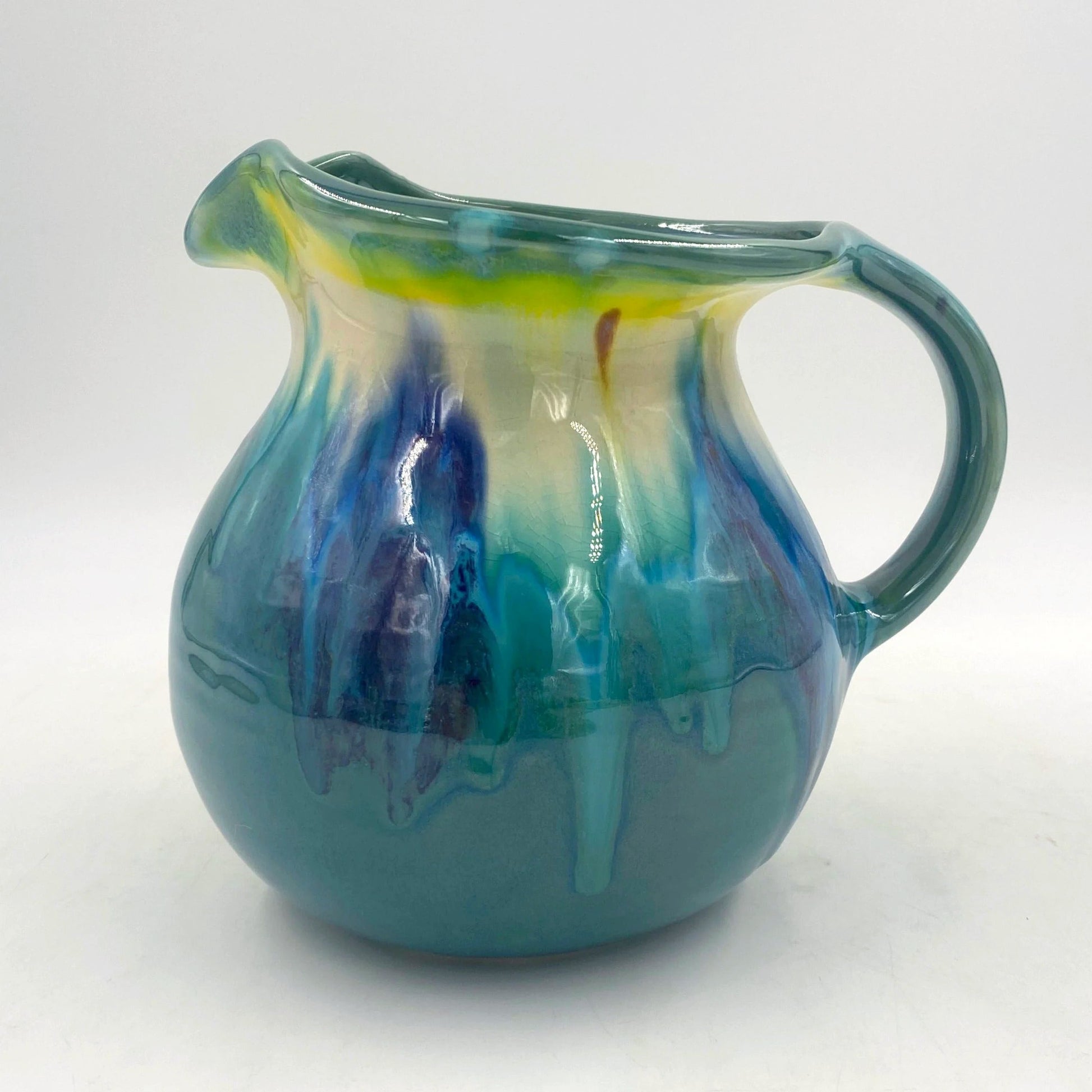large teal pitcher silhouette
